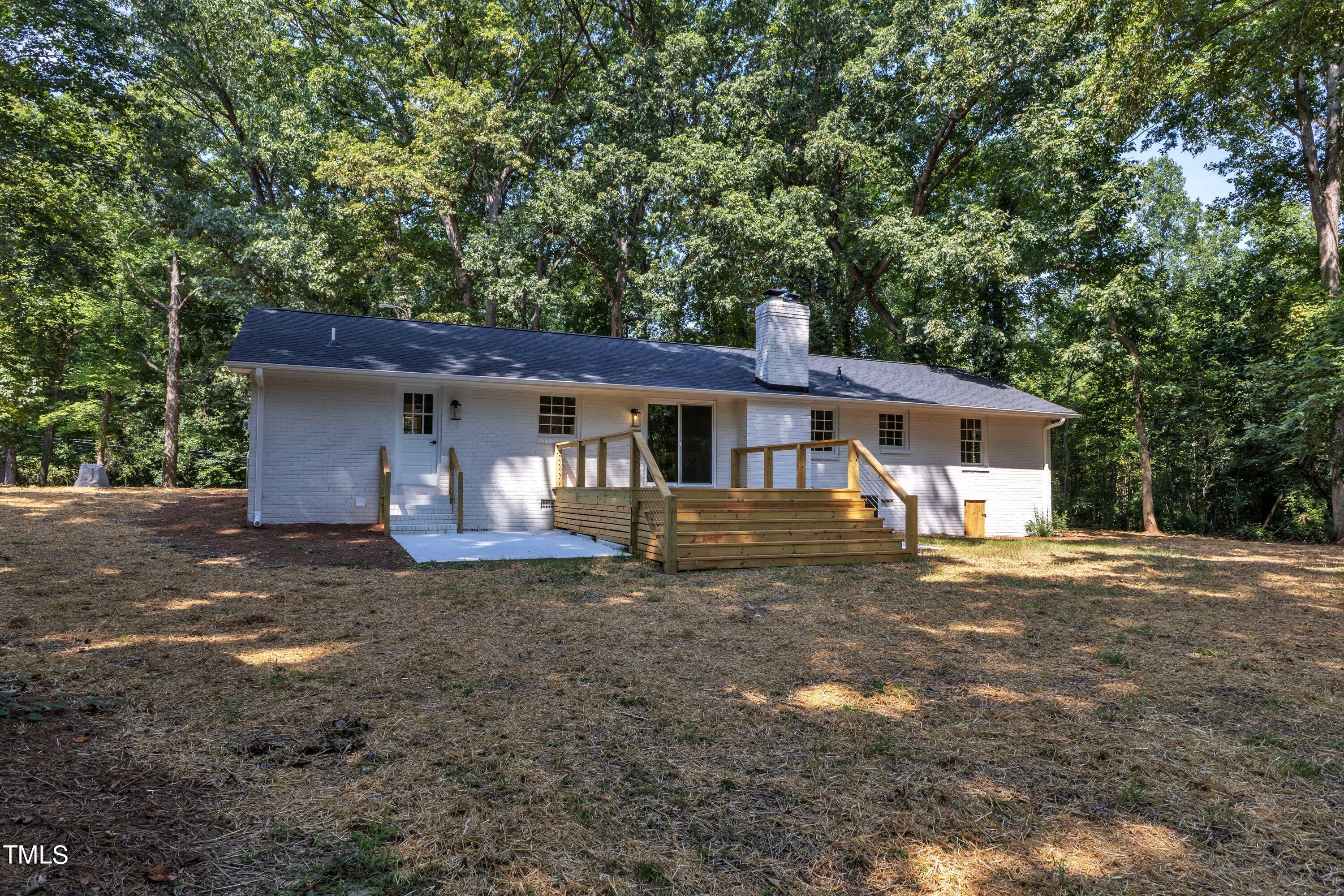 3023 Creech Road Garner, NC 27529 - Photo 33 of 42 a view of a house with a yard