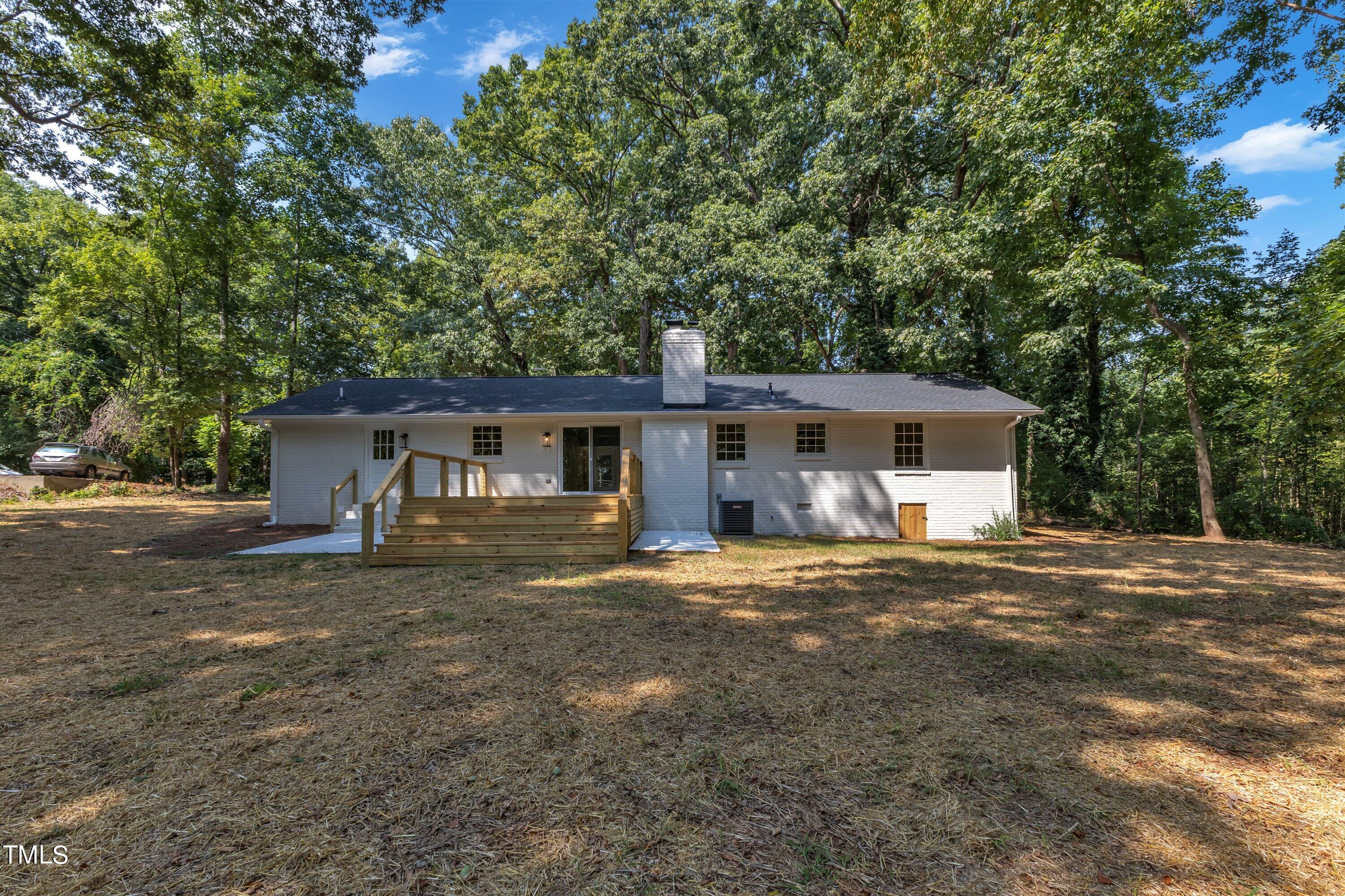3023 Creech Road Garner, NC 27529 - Photo 34 of 42 a view of a house with a yard