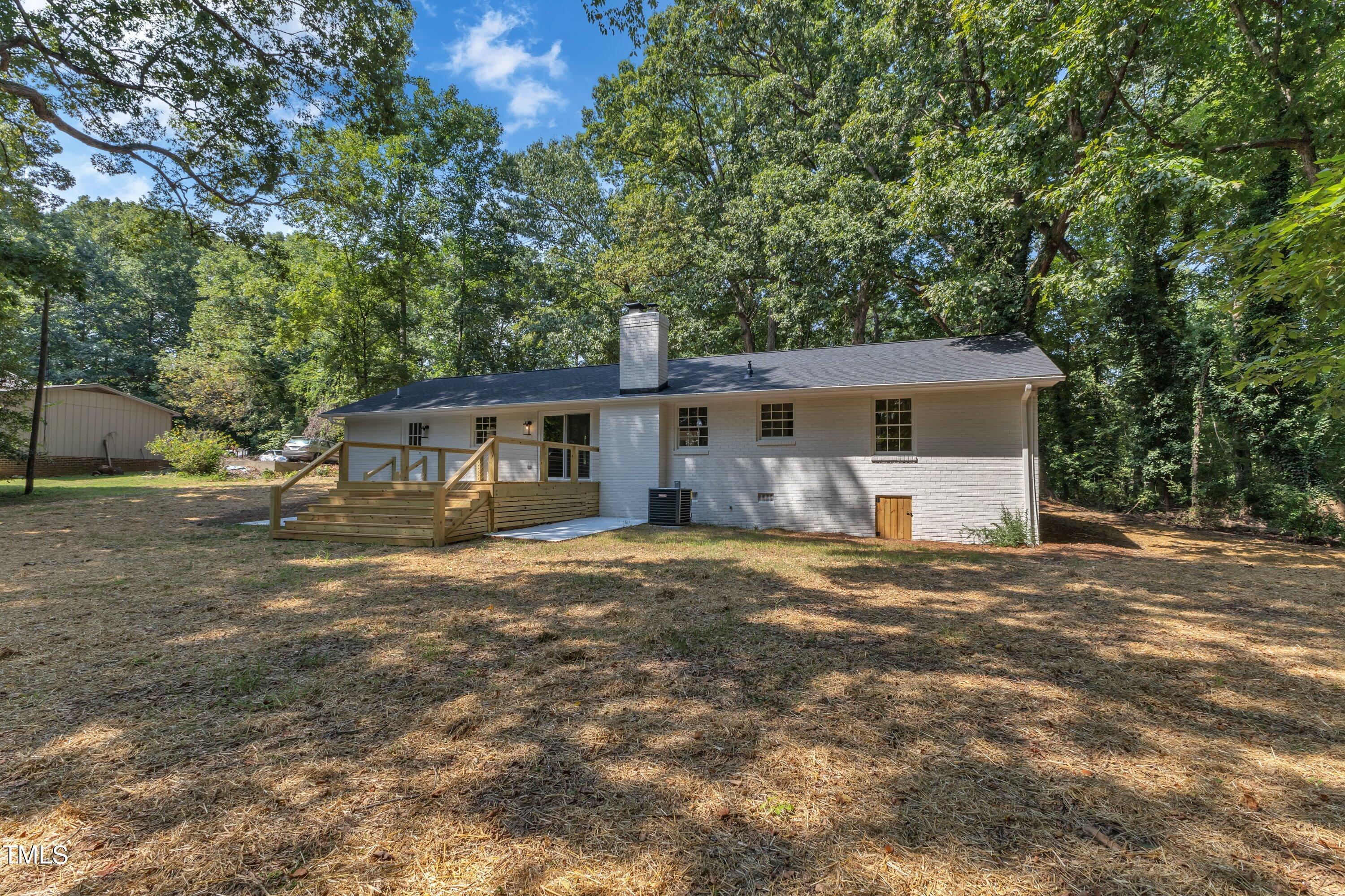 3023 Creech Road Garner, NC 27529 - Photo 35 of 42 front view of a house with a big yard