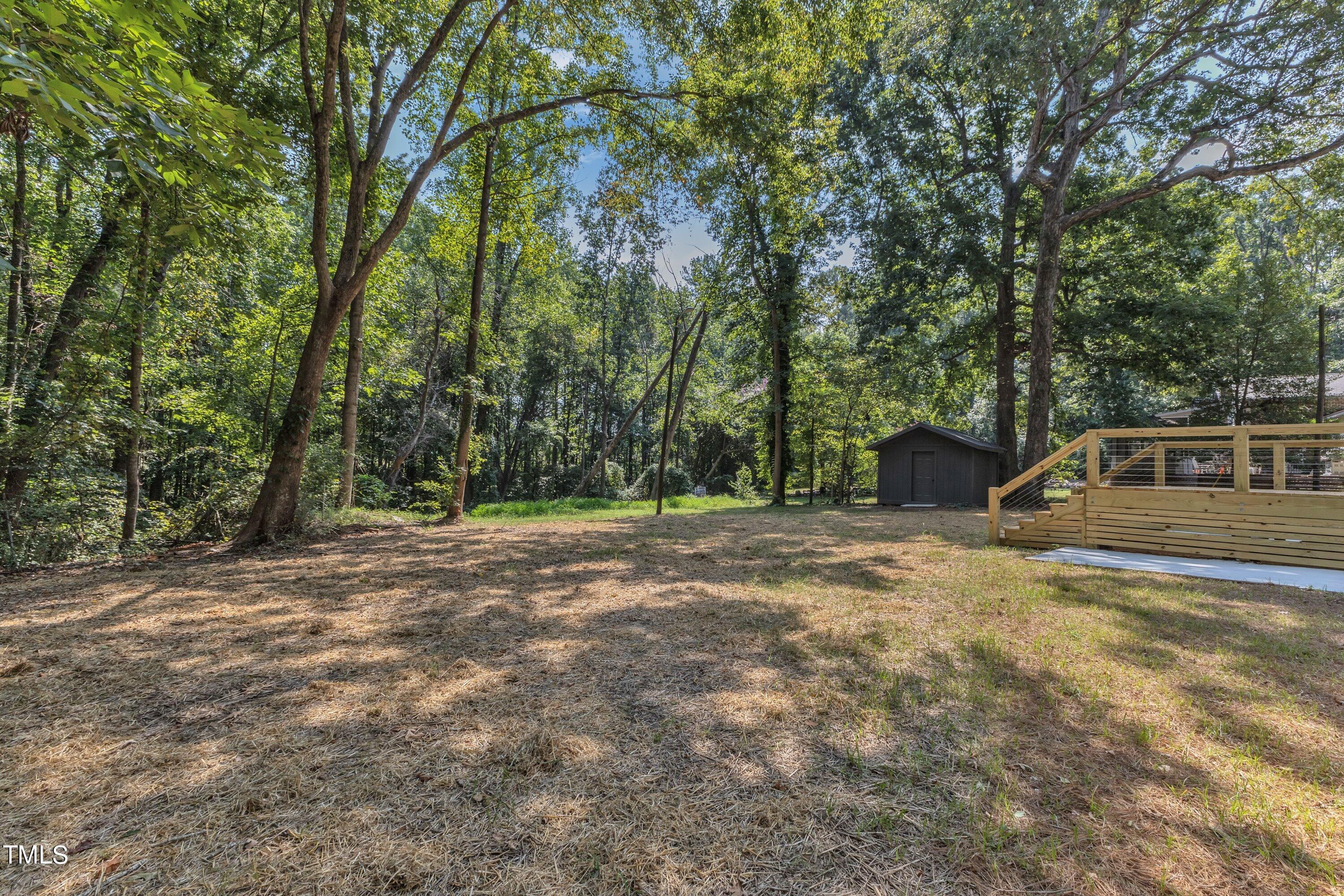 3023 Creech Road Garner, NC 27529 - Photo 36 of 42 a view of a outdoor space with trees