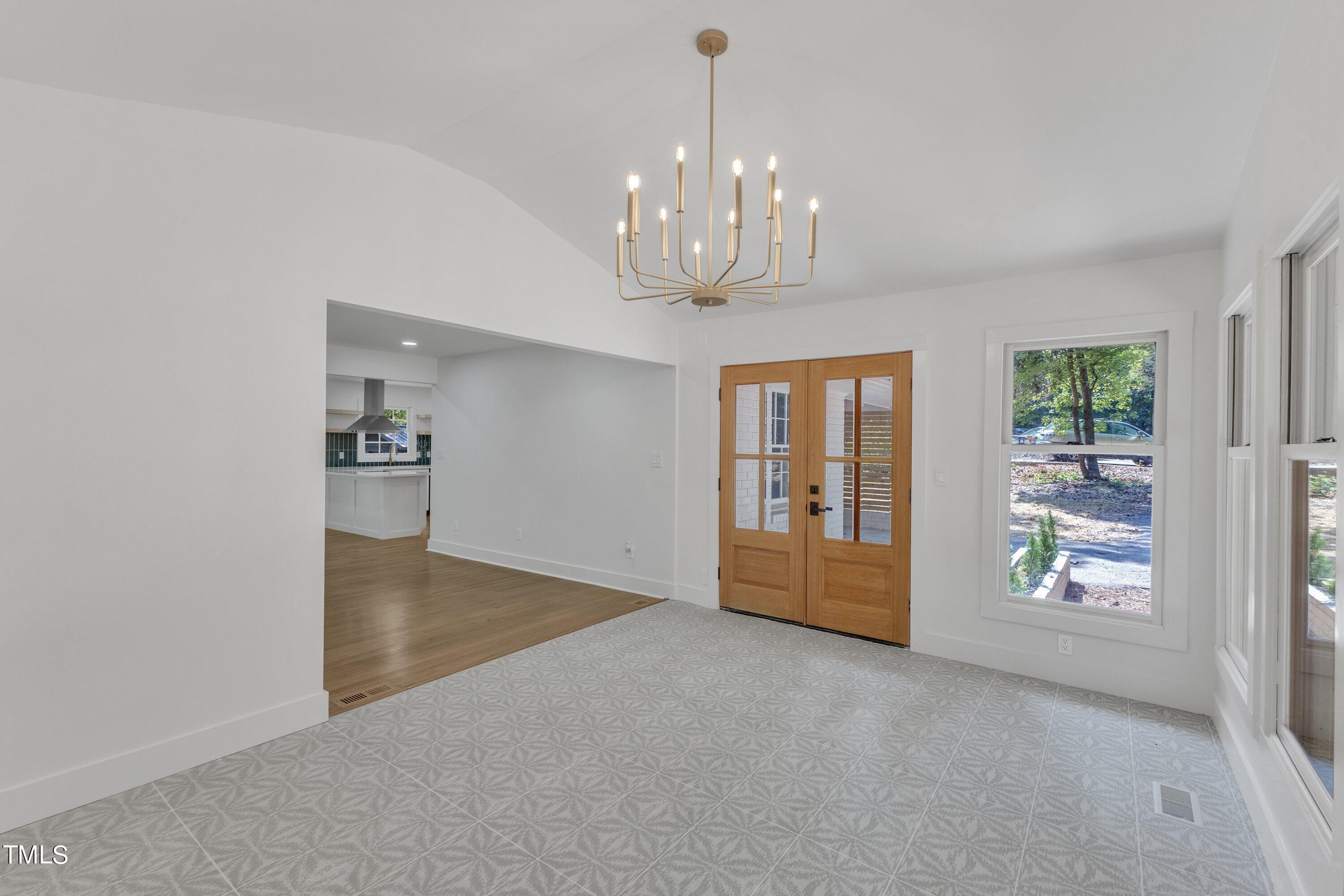3023 Creech Road Garner, NC 27529 - Photo 7 of 42 a view of an empty room with a window