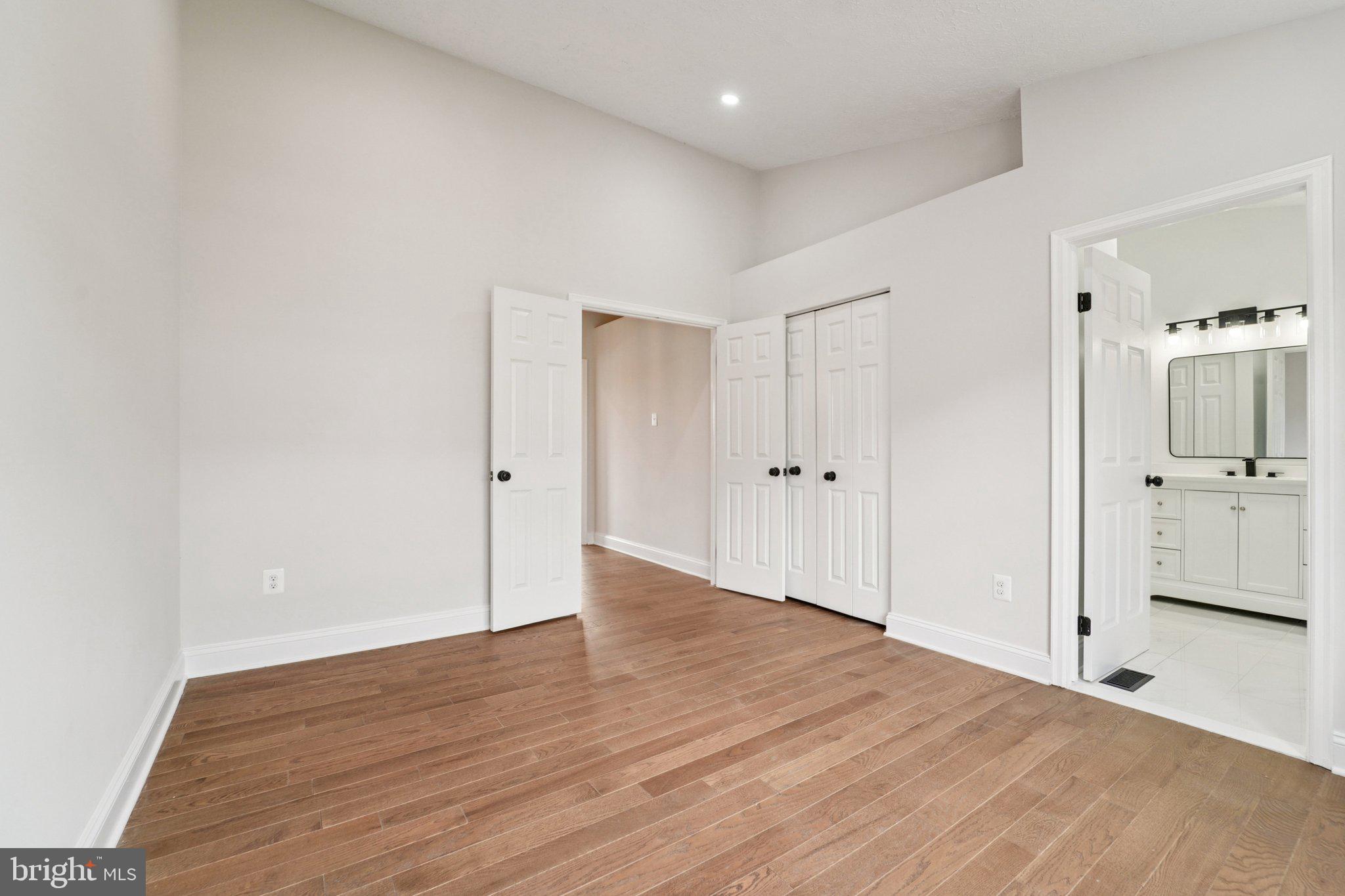 8727 Silver Hall Road Perry Hall, MD 21128 - Photo 14 of 35 a view of an empty room with wooden floor