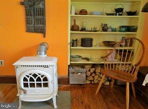365 Tiger Valley Road Washington, VA 22747 - Photo 16 of 53 Woodstove in the Dining Room