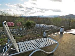 365 Tiger Valley Road Washington, VA 22747 - Photo 29 of 53 Primary Bedroom deck with mountain view