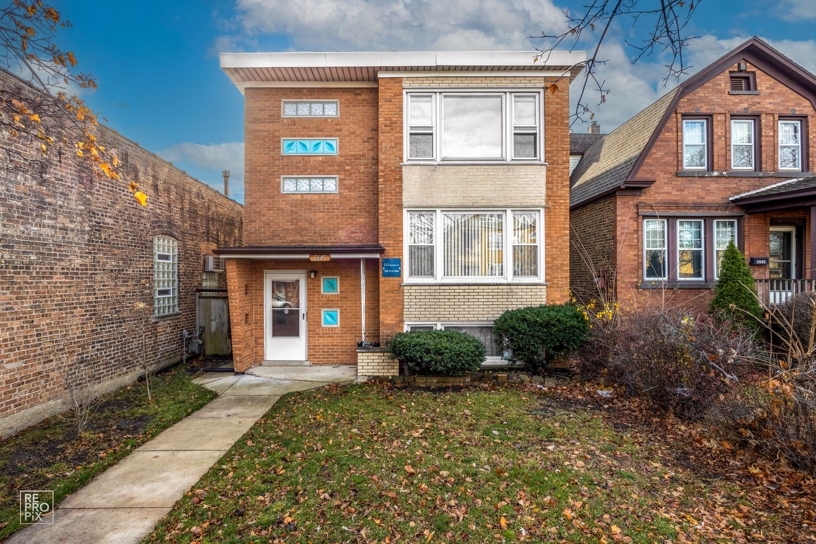 5645 West 63rd Place, Unit 2 Chicago, IL 60638 - Photo 1 of 13 a front view of a house