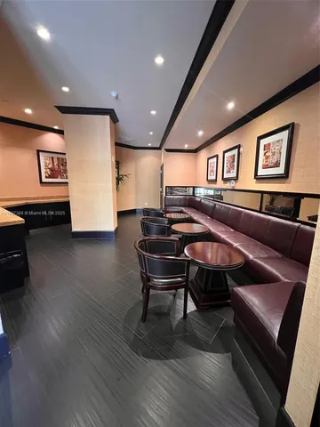 a view of a swimming pool with a yard