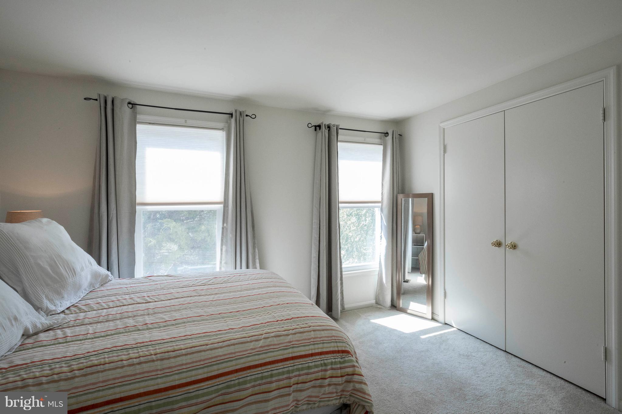 11935 Redtree Way Reston, VA 20194 - Photo 18 of 29 Guest Bedroom with Double Closets