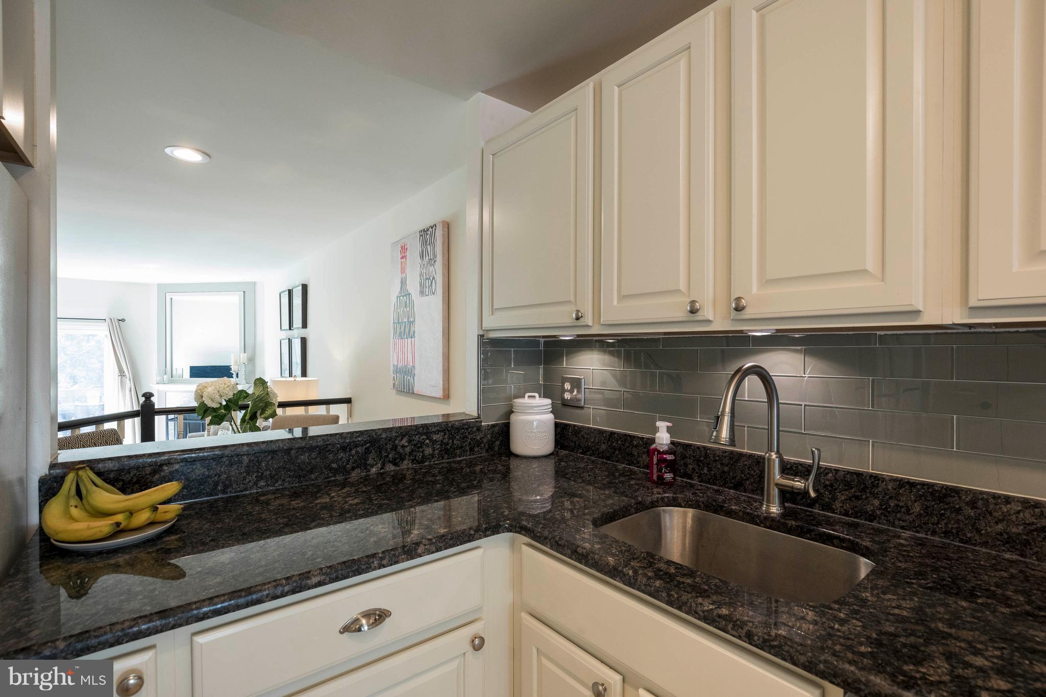 11935 Redtree Way Reston, VA 20194 - Photo 6 of 29 Window pass thru to dining room