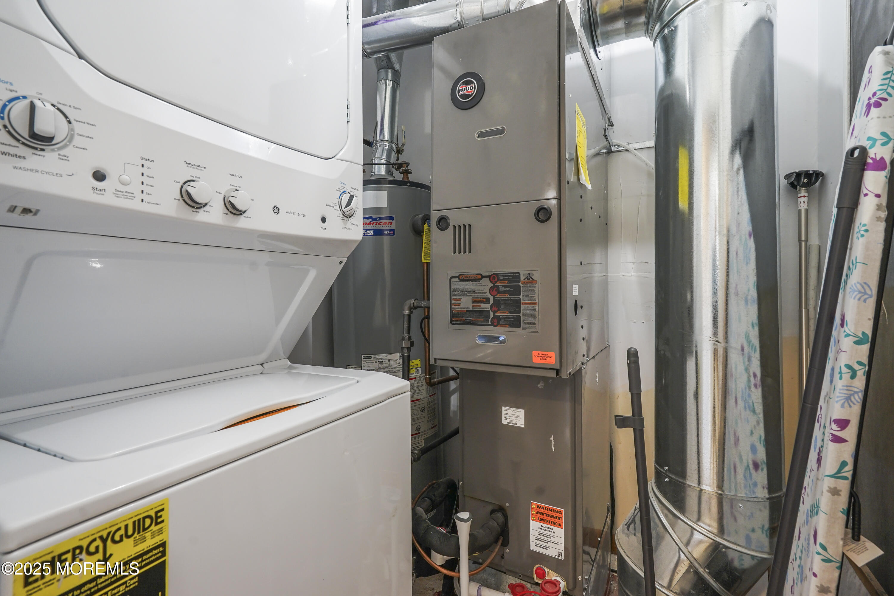 214 Webster Avenue, Unit 1 Seaside Heights, NJ 08751 - Photo 20 of 24 a utility room with dryer and washer