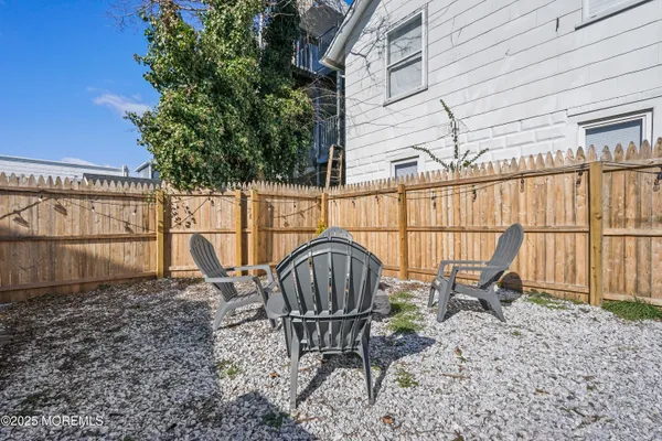 a garden view with a seating space