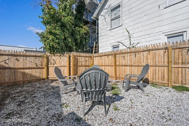 a garden view with a seating space