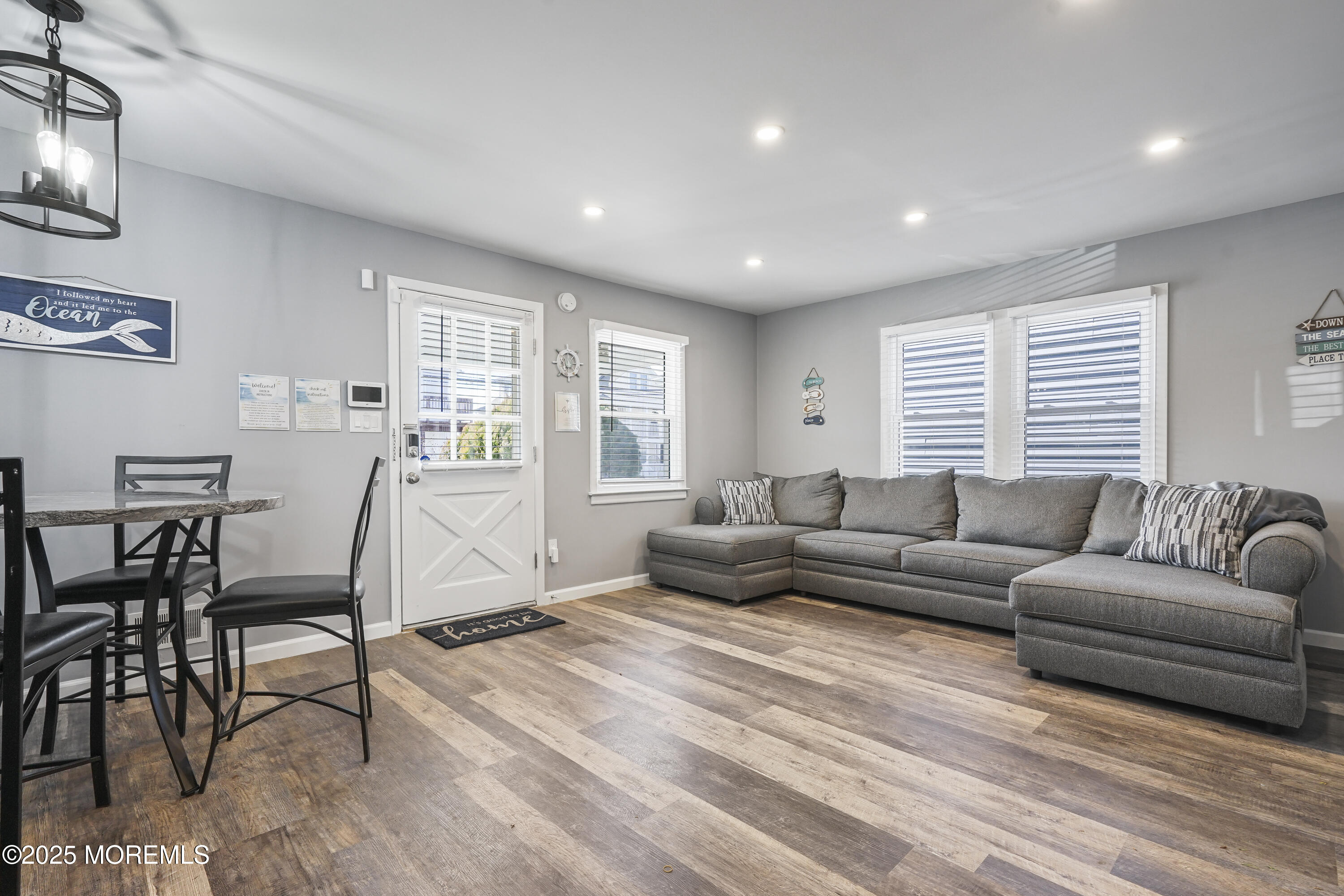 214 Webster Avenue, Unit 1 Seaside Heights, NJ 08751 - Photo 4 of 24 a living room with furniture and a window