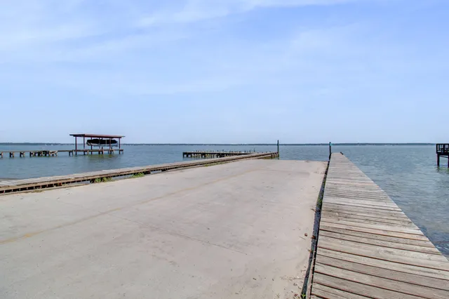 a view of wooden floor near a lake
