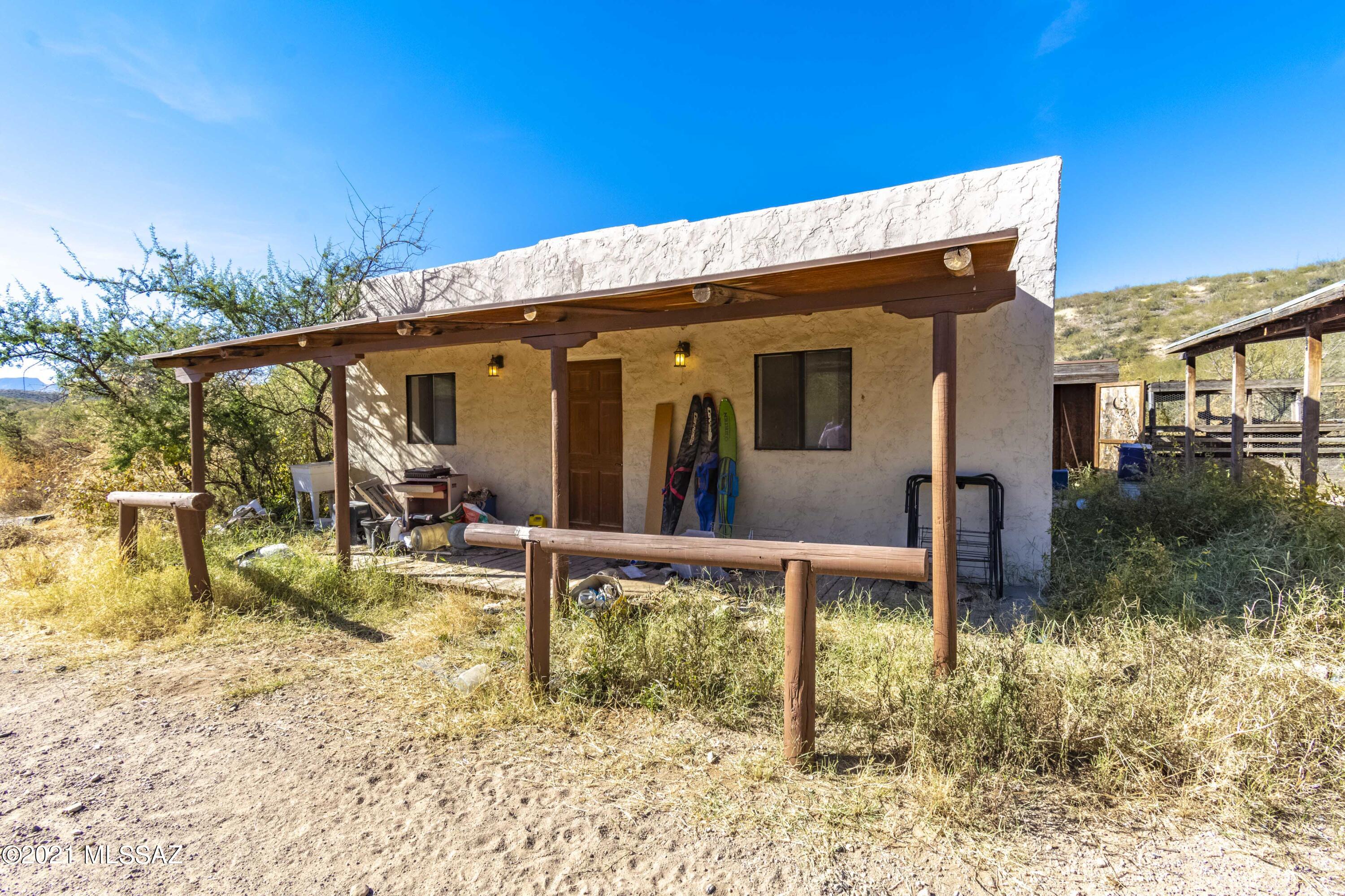15301 East Hillton Ranch Road Vail, AZ 85641 - Photo 30 of 33 a view of a house with backyard and sitting area