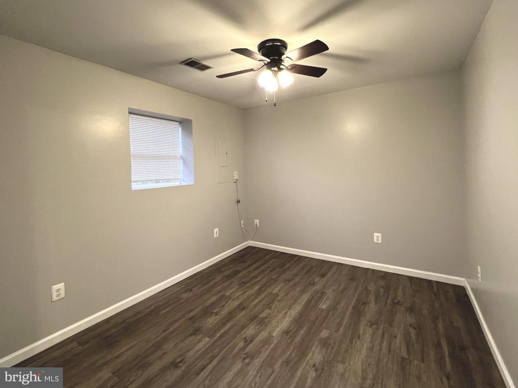 2610 Streamview Drive Odenton, MD 21113 - Photo 19 of 23 wooden floor in an empty room with a window