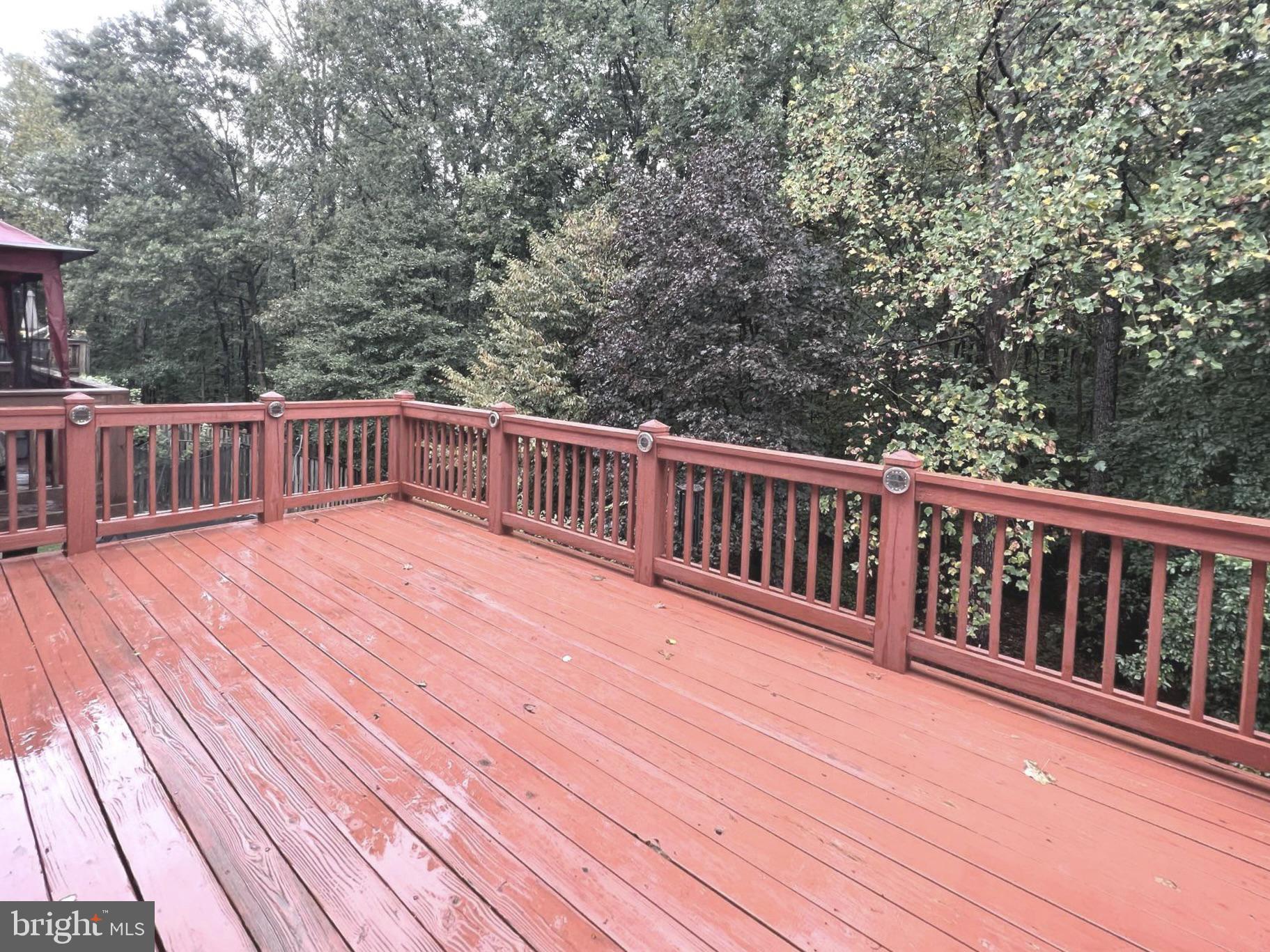 2610 Streamview Drive Odenton, MD 21113 - Photo 21 of 23 a balcony with wooden floor