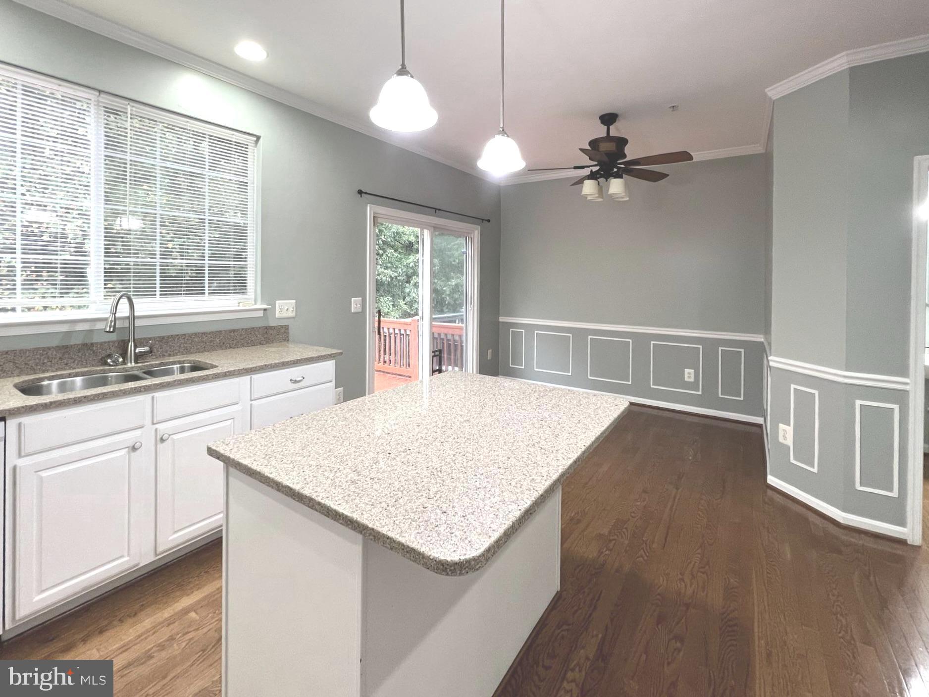 2610 Streamview Drive Odenton, MD 21113 - Photo 5 of 23 a kitchen with a sink a center island and a window