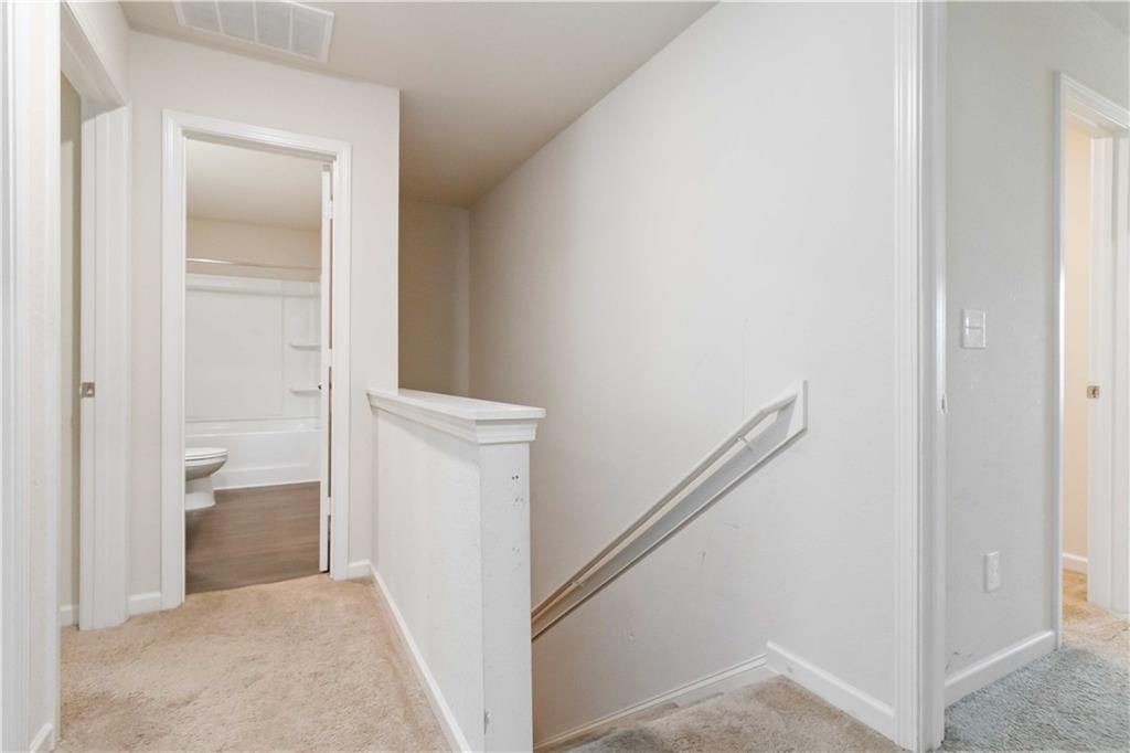 10794 Wheeler Trace Hampton, GA 30228 - Photo 18 of 35 a view of a hallway