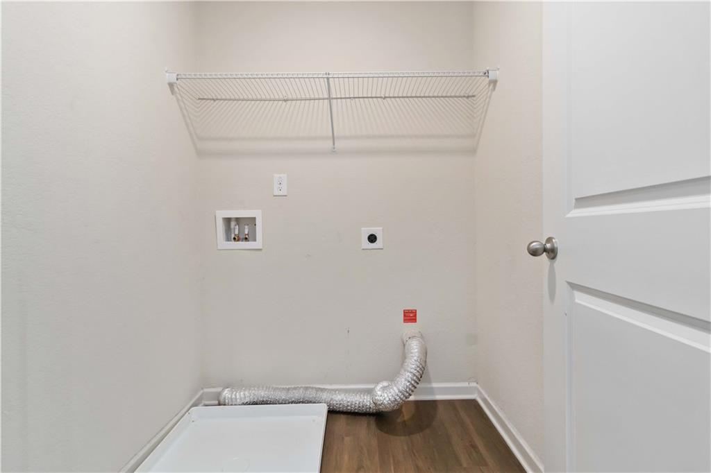 10794 Wheeler Trace Hampton, GA 30228 - Photo 23 of 35 a view of small space with racks on the wall