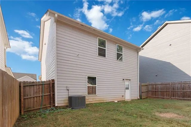 a view of park with large trees