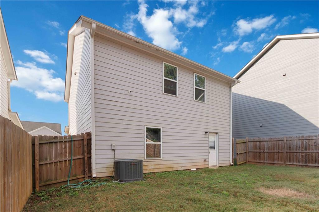 10794 Wheeler Trace Hampton, GA 30228 - Photo 33 of 35 a view of backyard of house