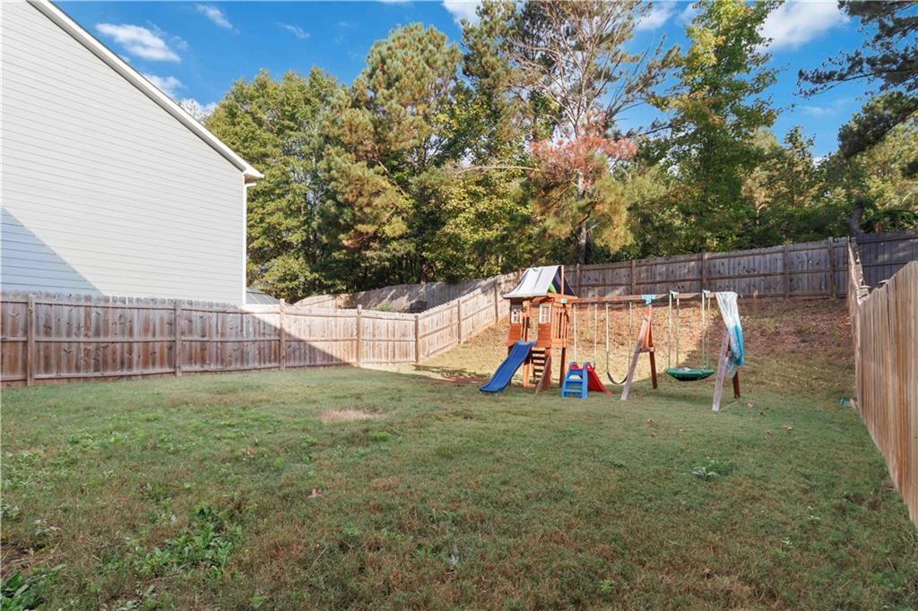 10794 Wheeler Trace Hampton, GA 30228 - Photo 34 of 35 a view of park with large trees