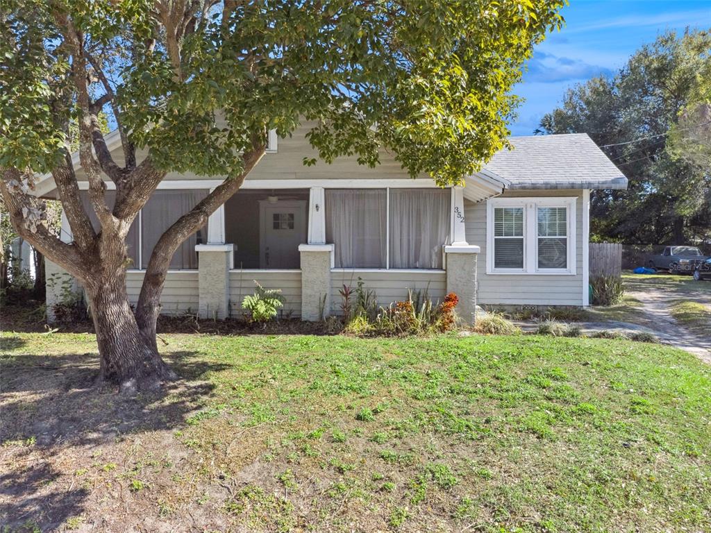 352 Cambridge Boulevard Winter Park, FL 32789 - Photo 34 of 35 a front view of house with yard and trees