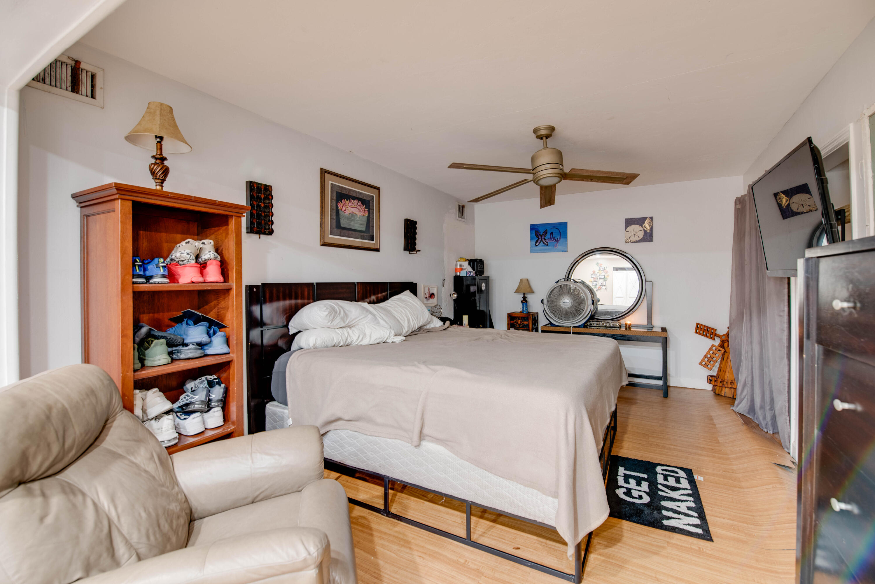 3341 Riviera Drive Key West, FL 33040 - Photo 15 of 33 a living room with furniture and a chandelier
