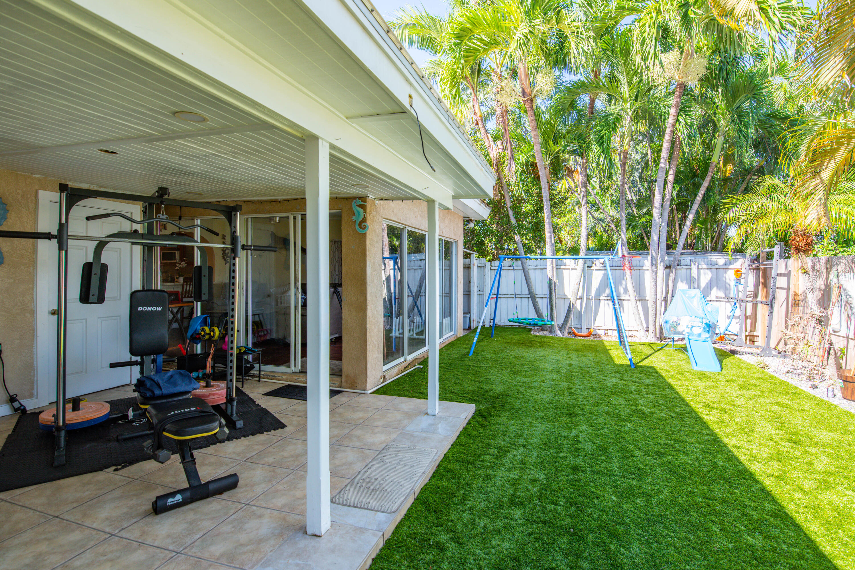 3341 Riviera Drive Key West, FL 33040 - Photo 26 of 33 a view of a patio with table and chairs
