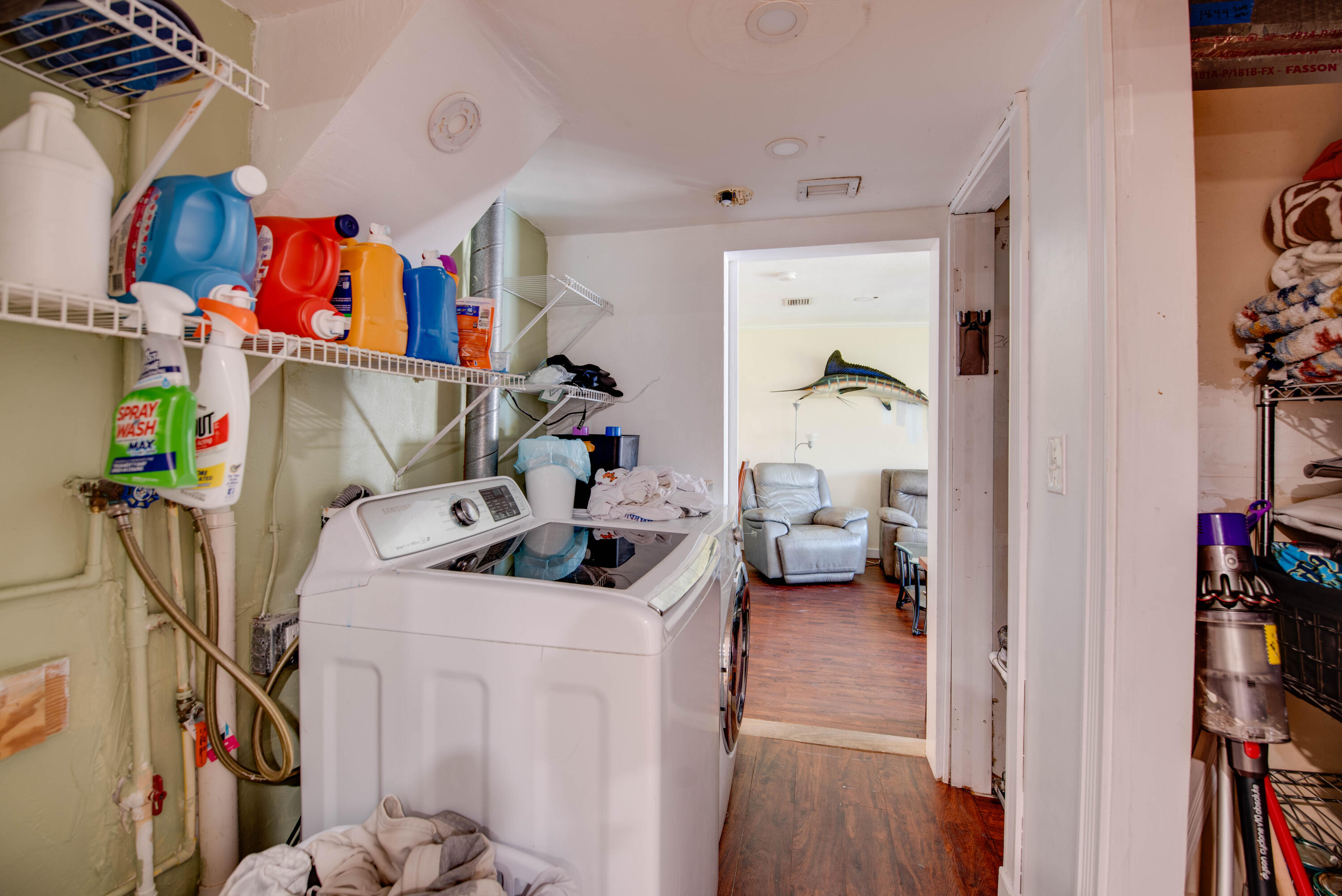 3341 Riviera Drive Key West, FL 33040 - Photo 27 of 33 a living room with furniture and a book shelf