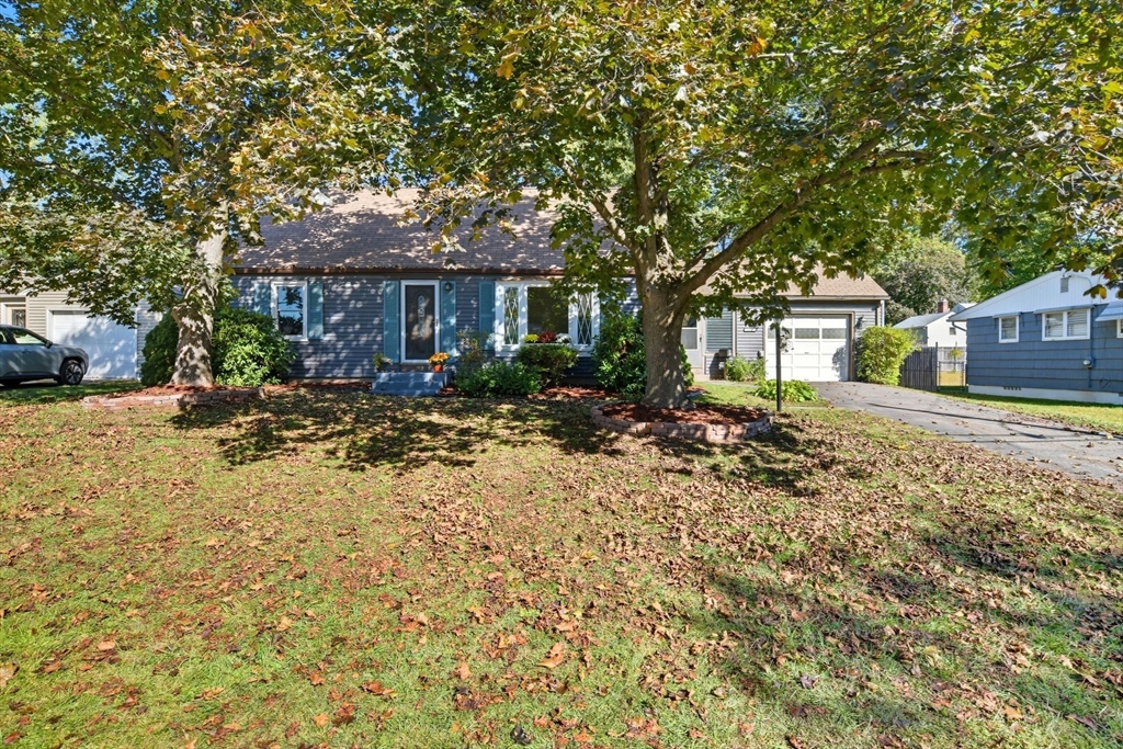 22 Colorado Street Springfield, MA 01118 - Photo 2 of 39 a front view of a house with a yard