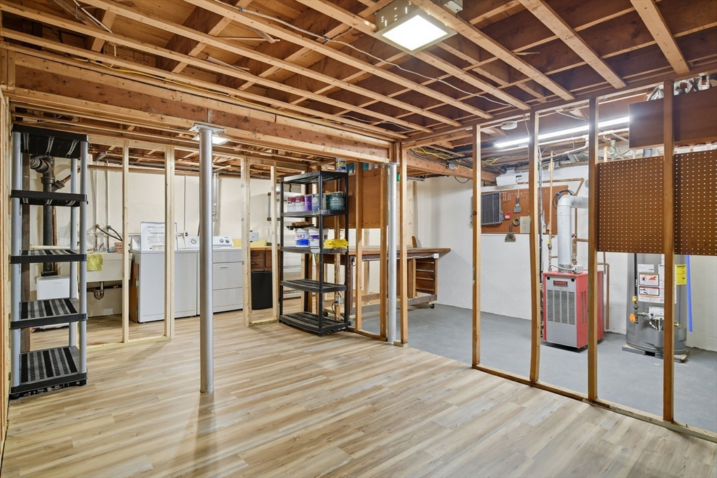 22 Colorado Street Springfield, MA 01118 - Photo 28 of 39 a view of an empty room with wooden floor
