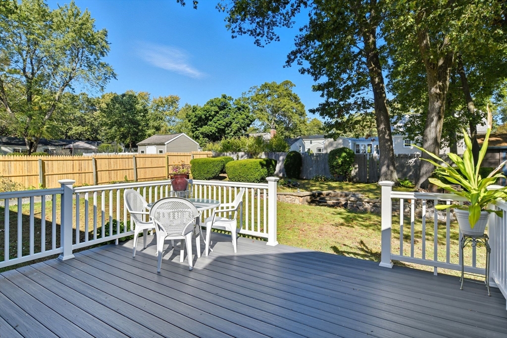 22 Colorado Street Springfield, MA 01118 - Photo 34 of 39 a view of a deck with two chair and wooden floor