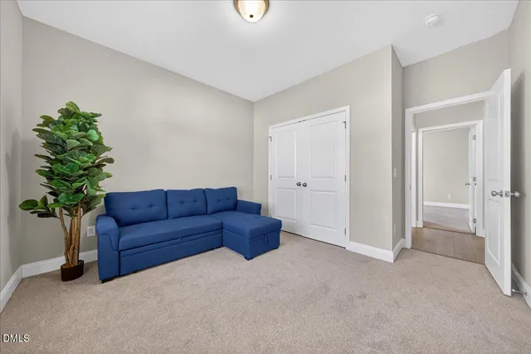 a living room with furniture and window