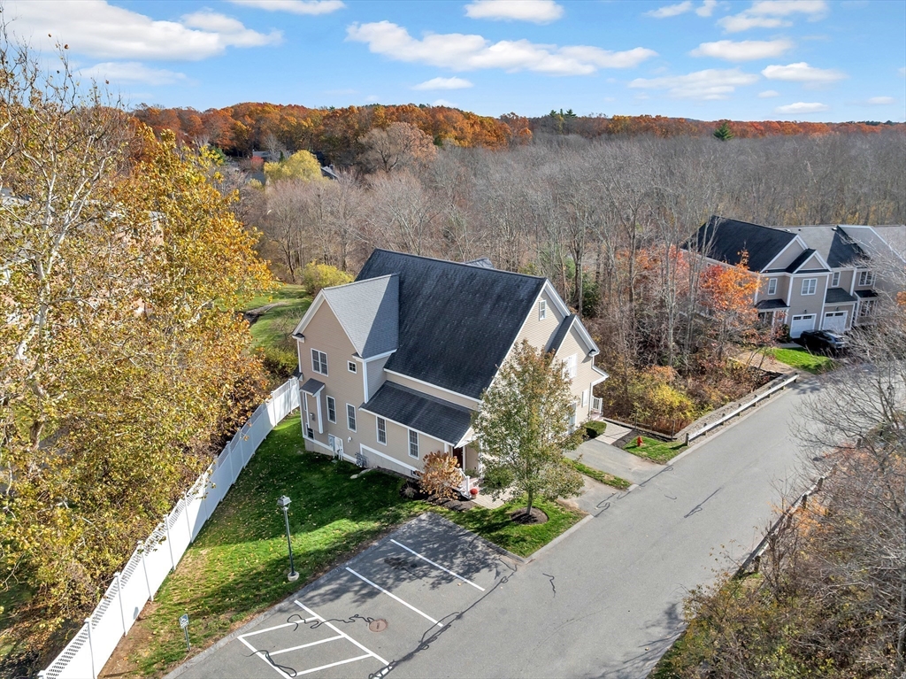 24 River Point Drive, Unit 6 Ipswich, MA 01938 - Photo 26 of 27 a view of a house with a yard