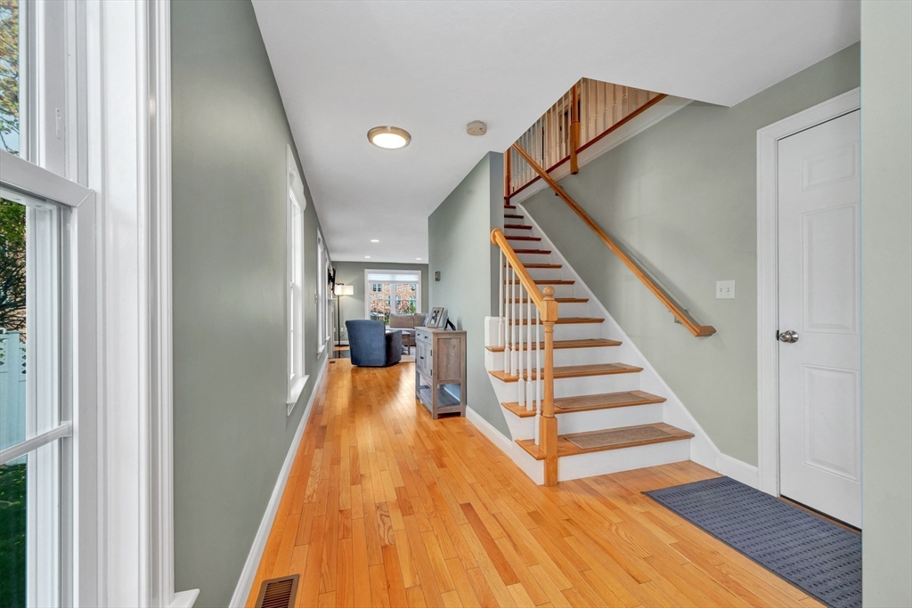 24 River Point Drive, Unit 6 Ipswich, MA 01938 - Photo 5 of 27 a view of entryway and hall with wooden floor