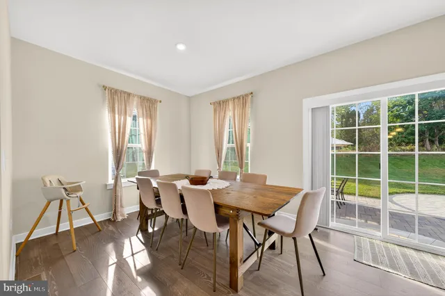 a bathroom with a sink a mirror and shower