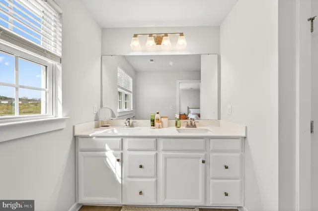 a swimming pool with outdoor seating