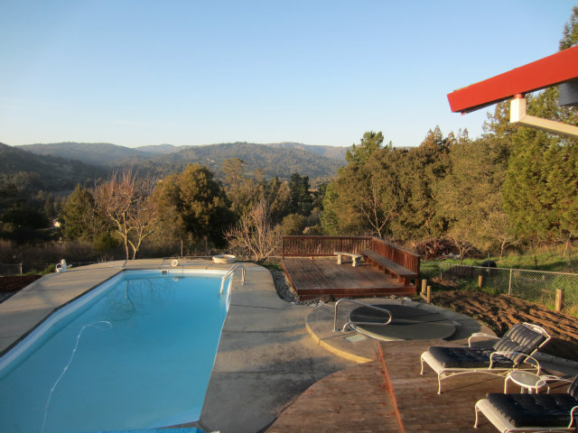 419 Poppy Hill Road Watsonville, CA 95076 - Photo 19 of 25 a view of a swimming pool with a patio