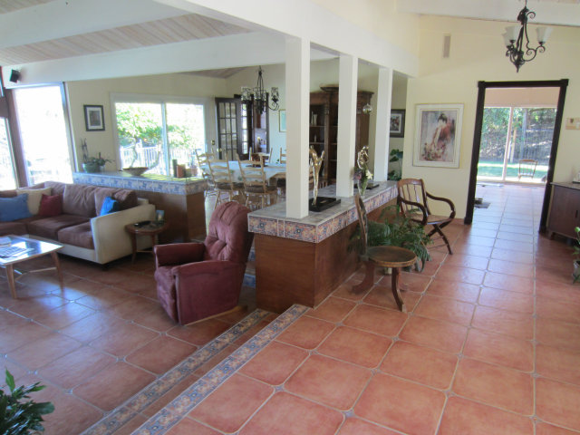 419 Poppy Hill Road Watsonville, CA 95076 - Photo 20 of 25 a living room with furniture and large windows