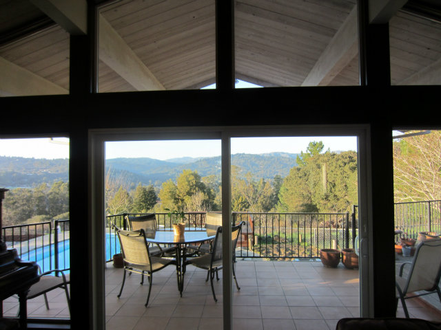 419 Poppy Hill Road Watsonville, CA 95076 - Photo 24 of 25 a view from a balcony with chairs