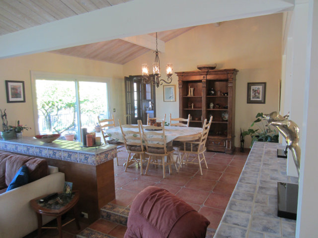 419 Poppy Hill Road Watsonville, CA 95076 - Photo 8 of 25 a view of a dining room with furniture window and outside view
