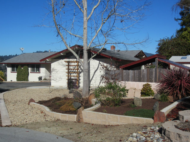 419 Poppy Hill Road Watsonville, CA 95076 - Photo 9 of 25 a view of a house with a yard