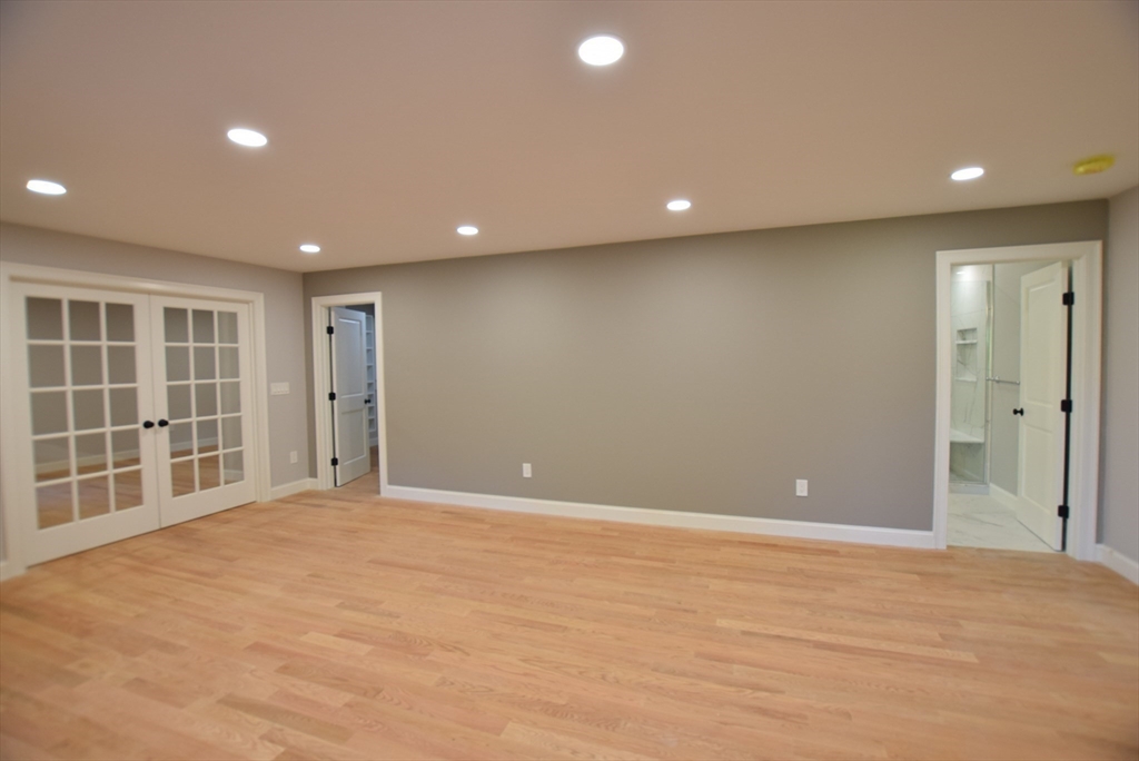 348 Boston Road Chelmsford, MA 01824 - Photo 24 of 42 an empty room with windows and cabinet