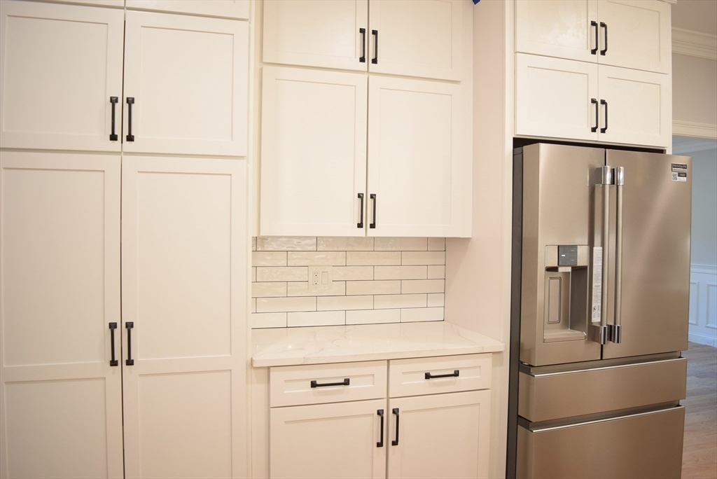 348 Boston Road Chelmsford, MA 01824 - Photo 4 of 42 a kitchen with appliances and cabinets