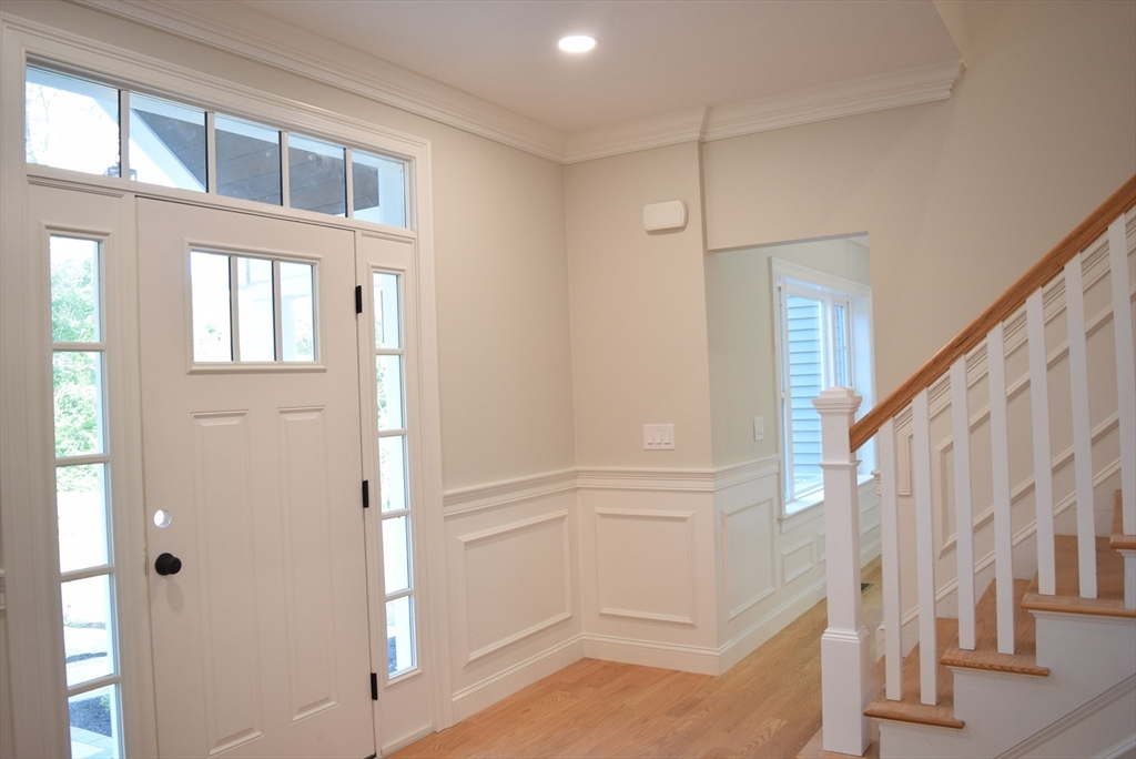 348 Boston Road Chelmsford, MA 01824 - Photo 8 of 42 a view of an entryway with staircase