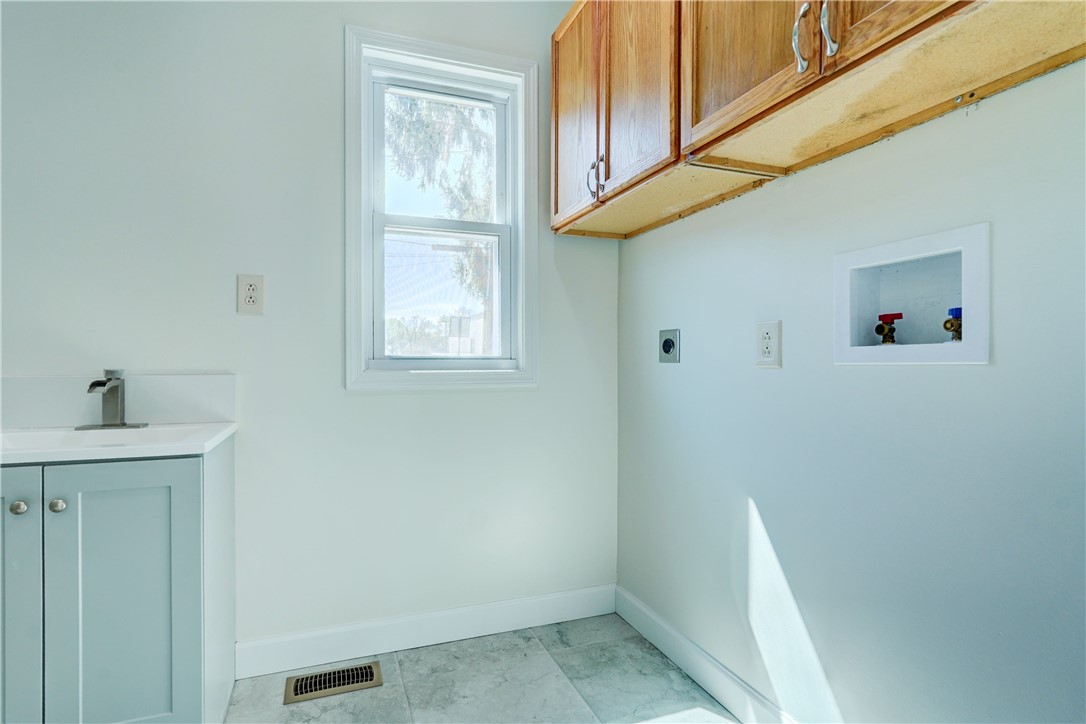 817 Ave D Rochester, NY 14621 - Photo 12 of 25 1st Floor Bathroom with Laundry
