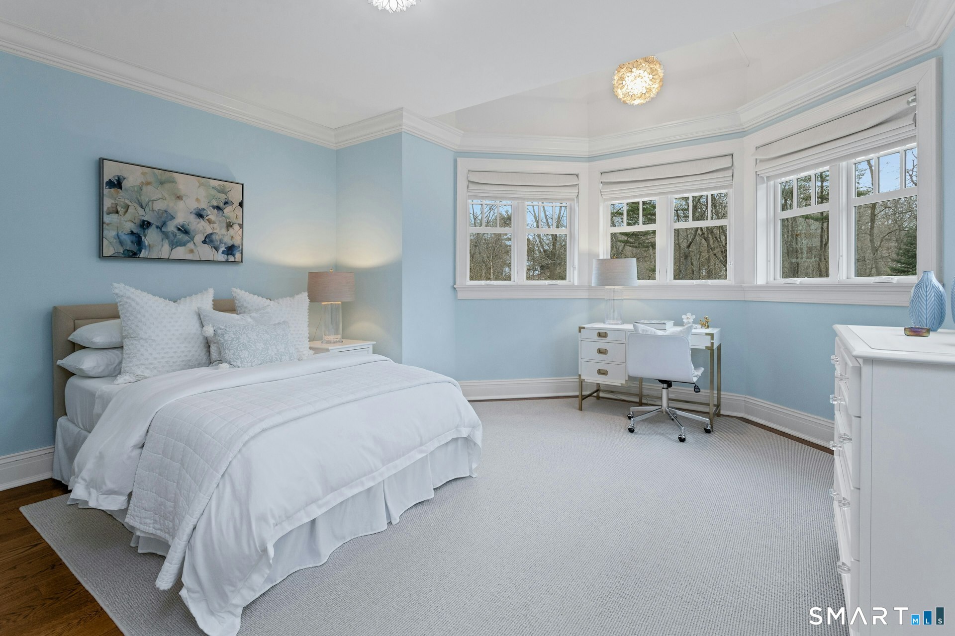 80 Compo Road North Westport, CT 06880 - Photo 23 of 40 a bedroom with a bed a table and a window