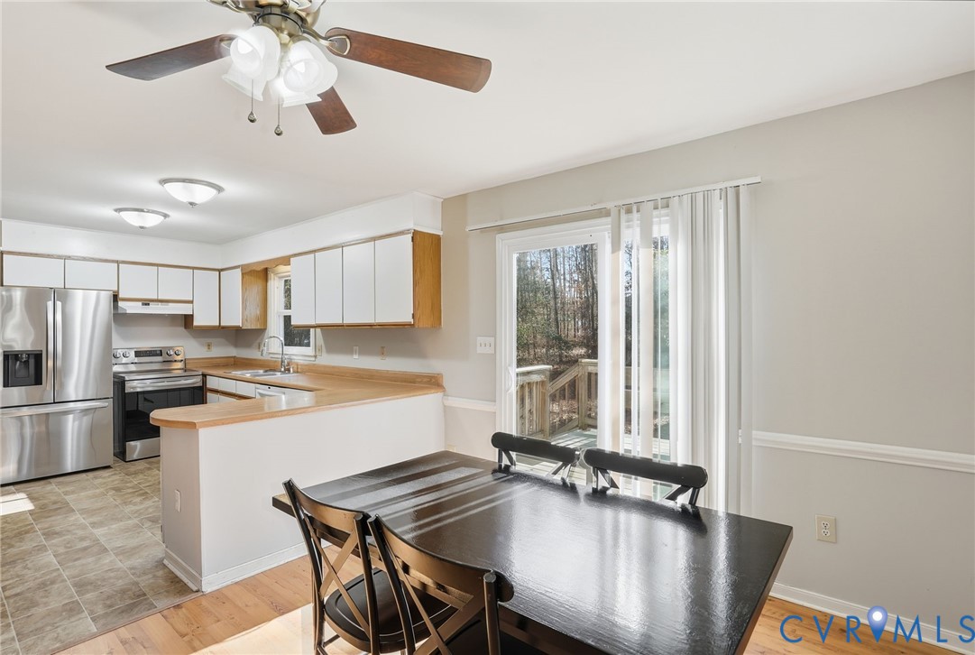 3605 Whitehouse Road Colonial Heights, VA 23834 - Photo 15 of 46 Dining area with a ceiling fan and light wood fini