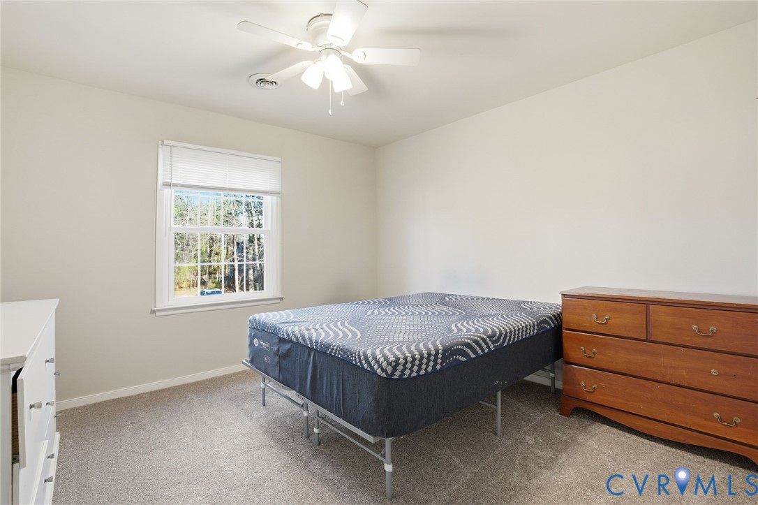 3605 Whitehouse Road Colonial Heights, VA 23834 - Photo 24 of 46 Bedroom with light carpet and ceiling fan
